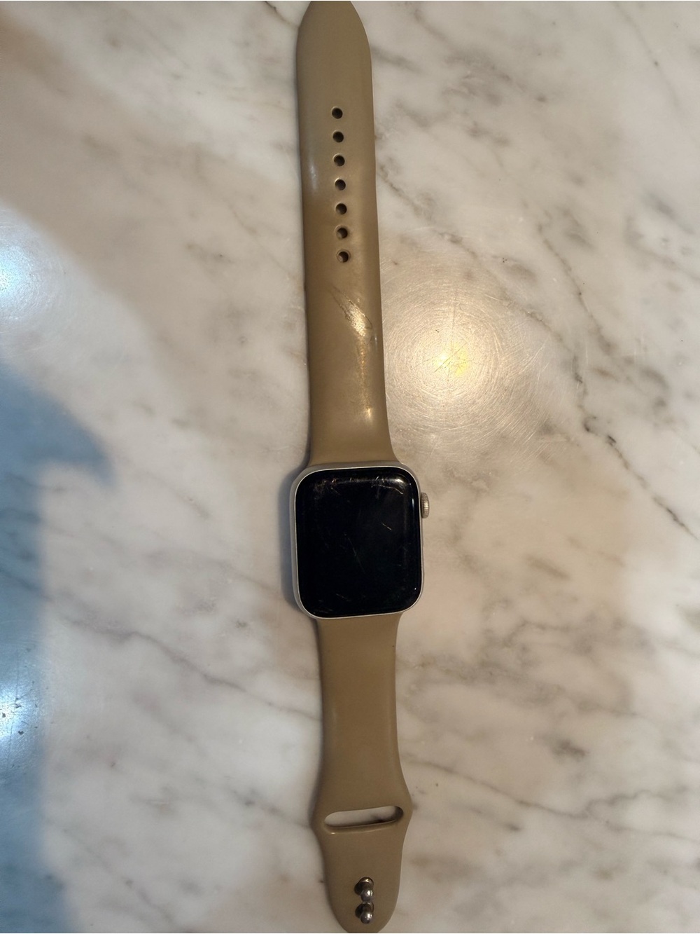 Apple Watch with Beige Silicone Band and Silver Case